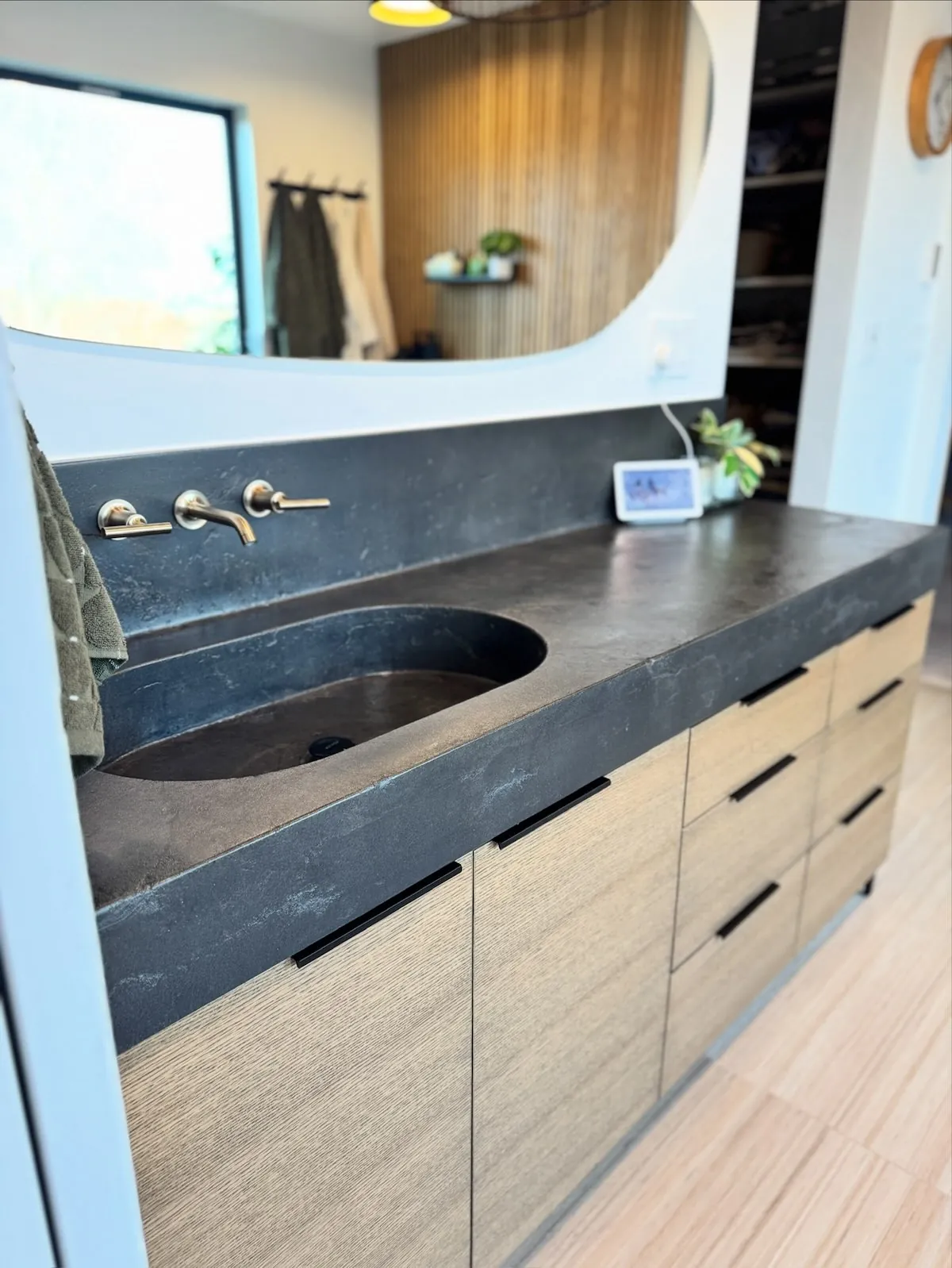 Concrete powder room vanity with integral sink